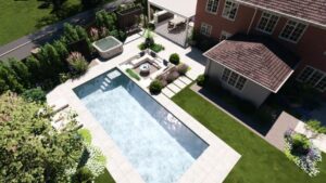 rear garden was reimagined with large-format porcelain patios, feature pathways, a sunken gathering space, and tailored planting zones